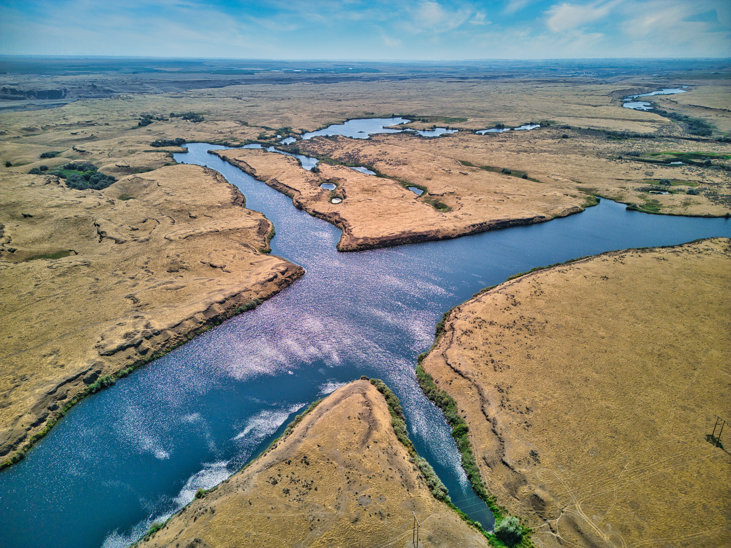 Aerial view of T-Lake Ranch lakes and rolling plains